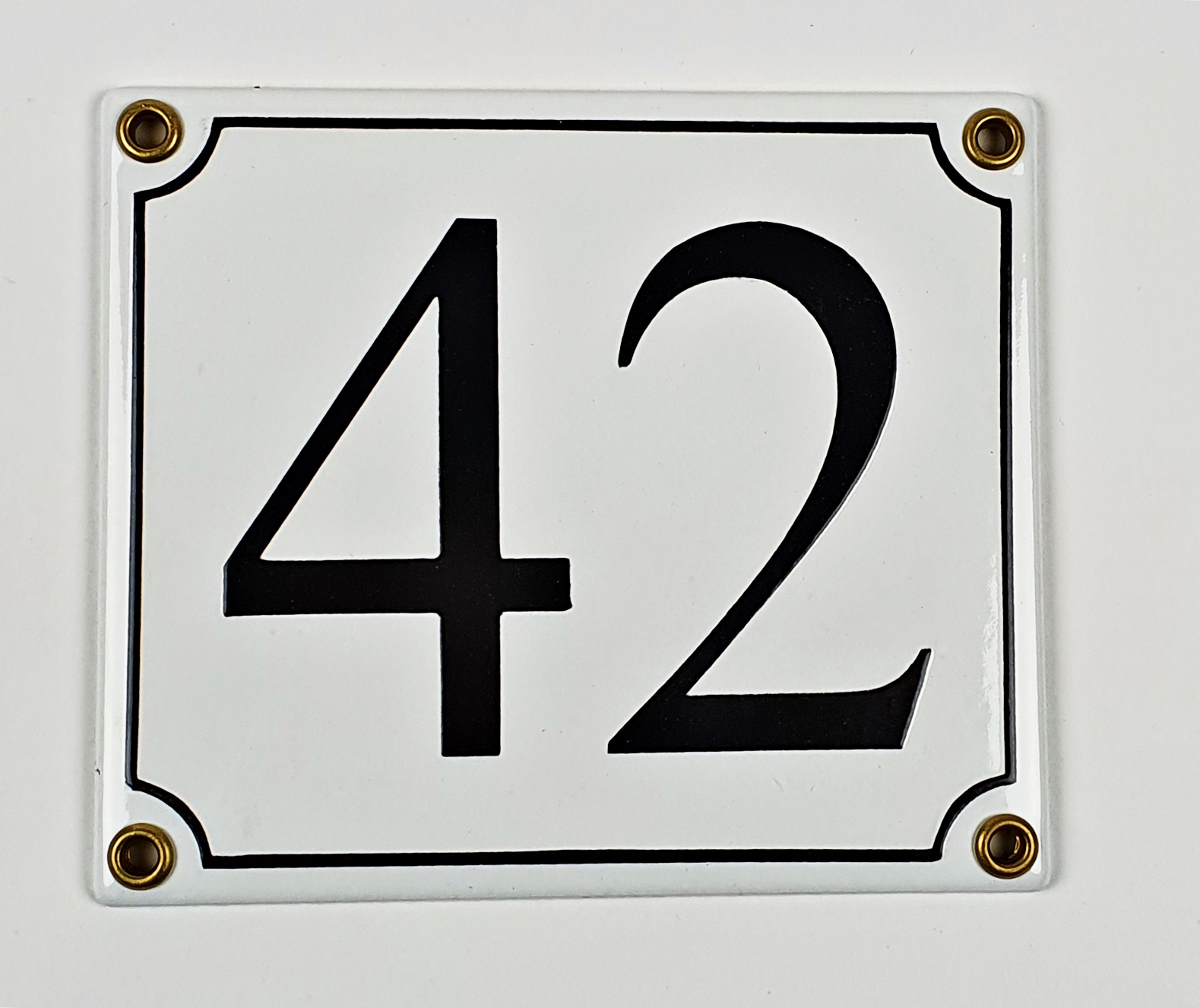 42-serif Hausnummernschild 42 weiß Serif 14x12 cm Emailleschild