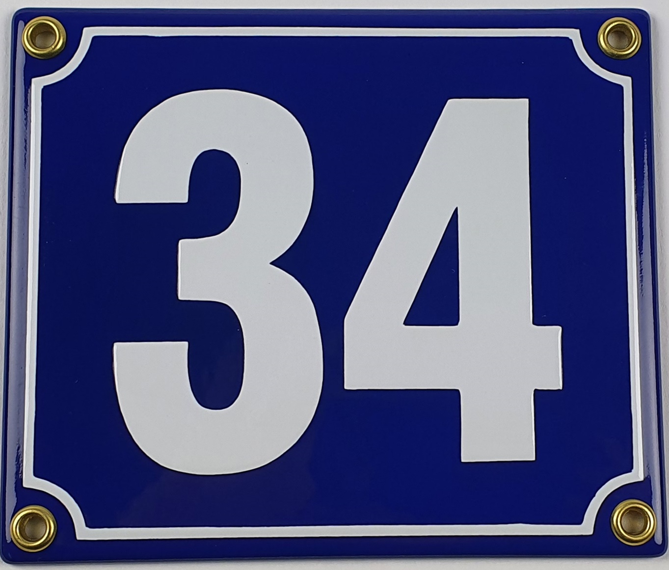 emaille-34-blau Hausnummernschild 34 blau Blockschrift 14x12 cm Emailleschild